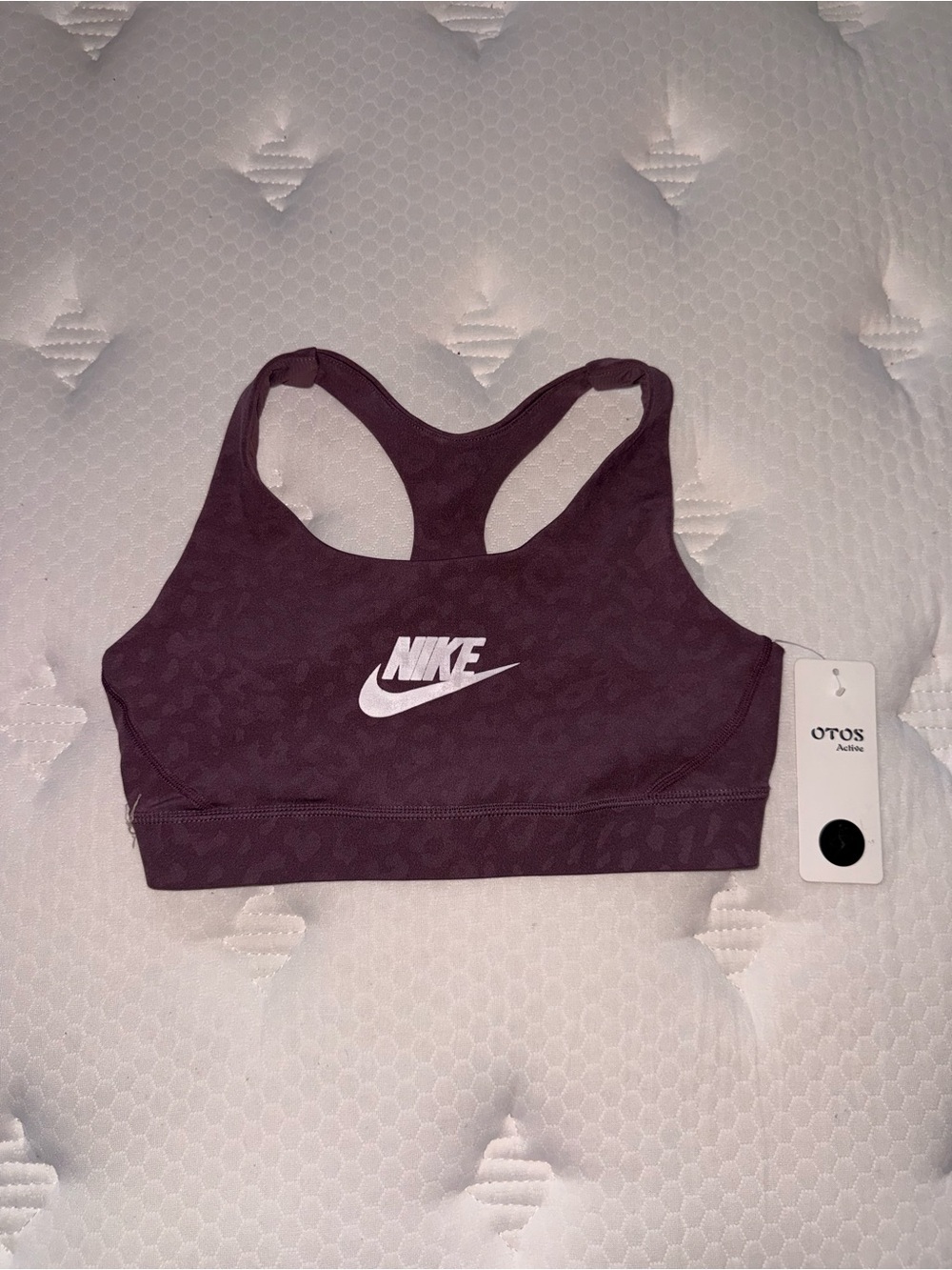 51. Nike Women's Purple Racerback Sports Bra